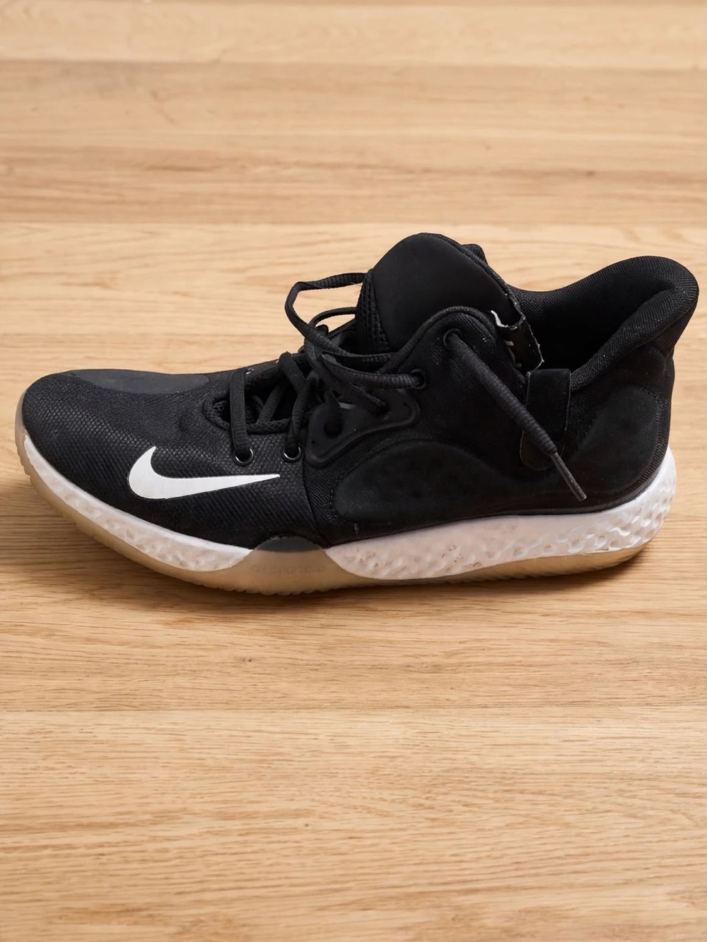 Nike Black Athletic Sneakers with White Swoosh
